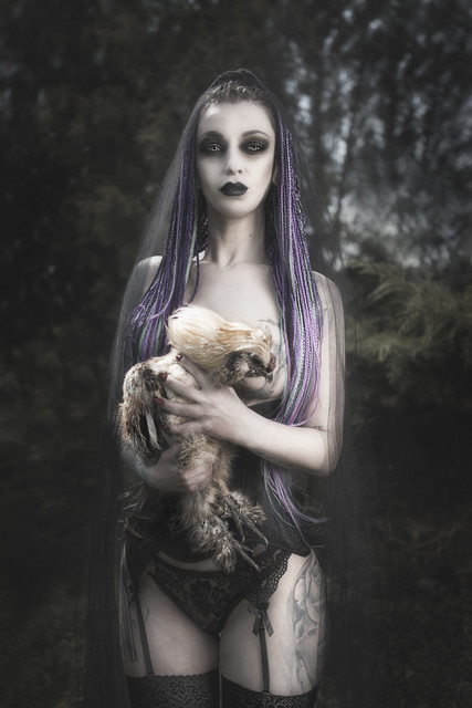 Santa Muerte with a hen PRZEMEK KIJOWSKI #339161